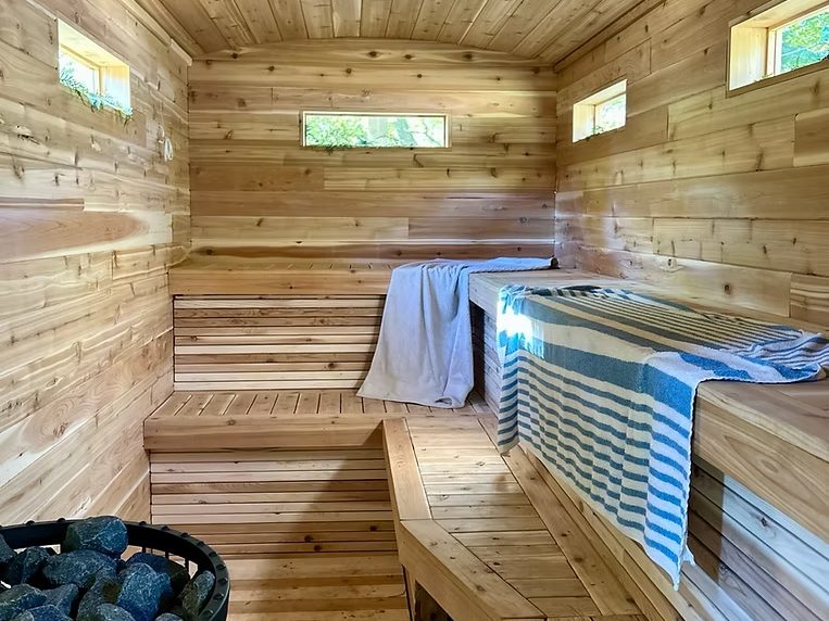 The finished cedar interior and both bench tiers